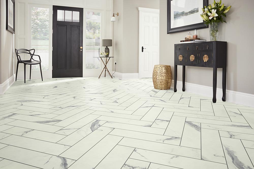 Entry Foyer Luxury Vinyl Tile Herringbone LVT -  Thompson Interiors in  Lake Odessa, MI